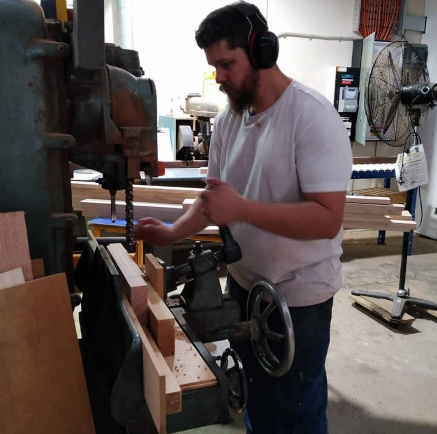 Jhan, owner of Dovetail Architectural Joinery, working in the Wingfield workshop