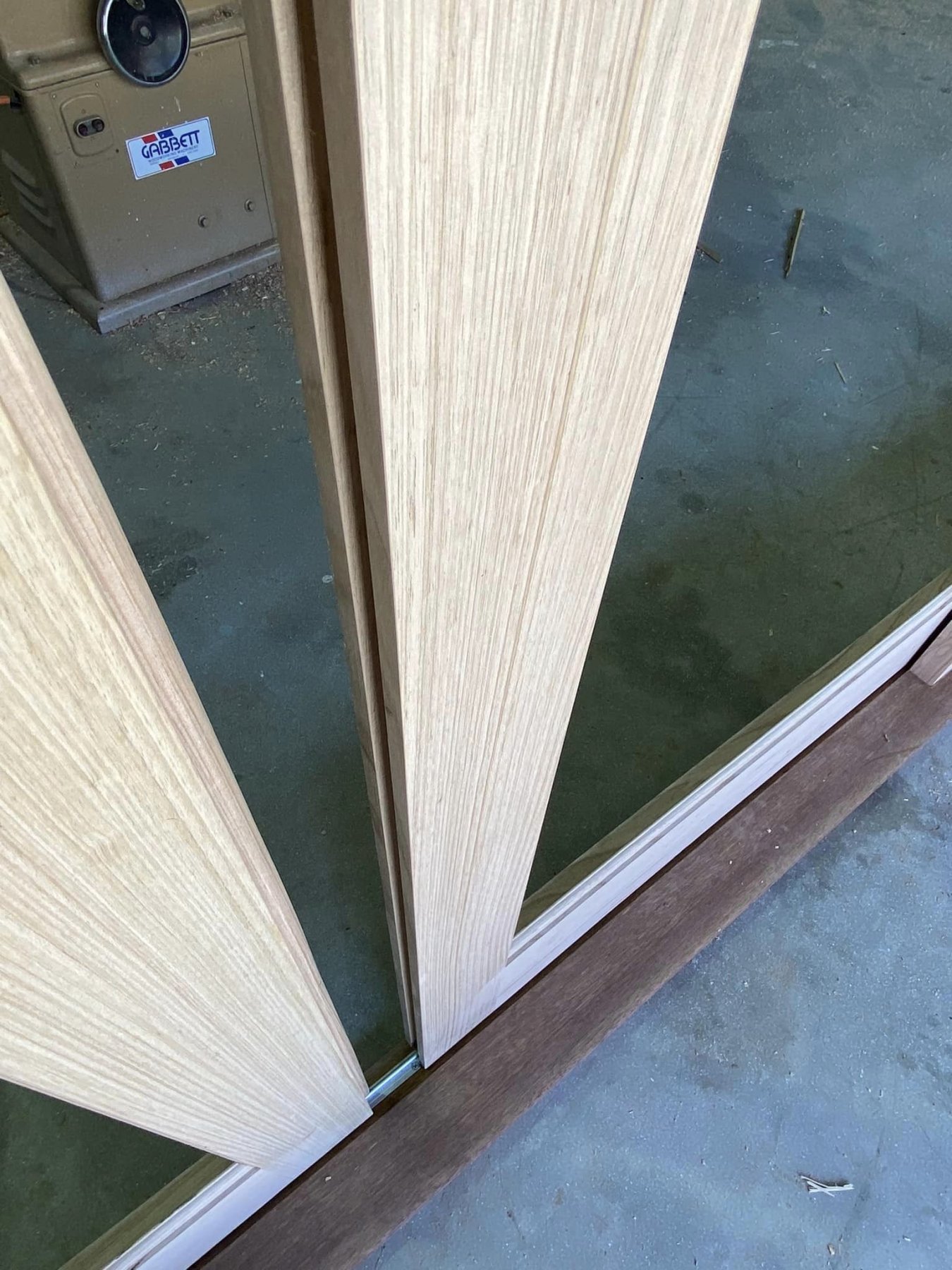 Close-up detail of vertical timber slat cladding on a feature entry door